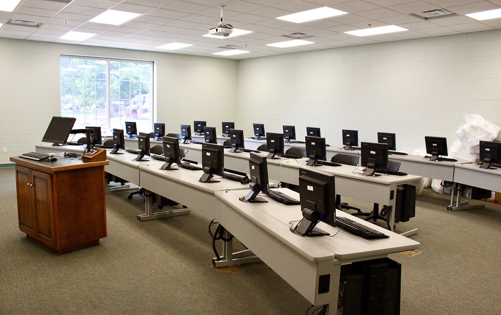 Learners in a computer classroom during a technical training session